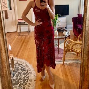 Red dress with suede flower details